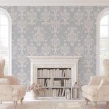 Little Debbie's Damask Wallpaper from The 7th Haven Interiors in a cozy living room setting.
