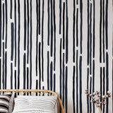 Stripped by Spencer Wallpaper from The Tamra Judge Line featured in a beautifully styled bedroom.
