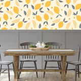 Lemmy Wallpaper by Wall Blush with citrus design in a modern dining room, enhancing room aesthetics.
