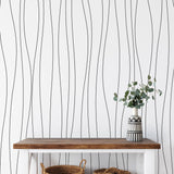 Wall Blush's High Glades Wallpaper in a stylish hallway, accentuating the wall decor focus.
