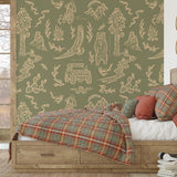 Cozy bedroom featuring The Rayco Line Adventure Awaits (Green) Wallpaper with rustic decor.

