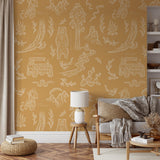 Wall Blush 'Adventure Awaits (Orange) Wallpaper' in stylish living room setup, highlighting cozy interior design focus.