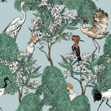"Mangrove Wallpaper by Wall Blush with tropical birds and foliage design in a modern living room setting."