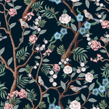 "Wall Blush's Ophelia Wallpaper featuring floral and bird design, ideal for enhancing a bedroom's ambiance."