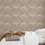 Bloom Wallpaper by The Minty Line in cozy bedroom setting, elegant floral pattern focus.
