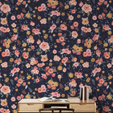 In Bloom (Navy) Wallpaper by Wall Blush in a stylish home office, showcasing floral design focus.
