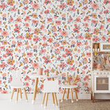In Bloom (White) Wallpaper by Wall Blush on full display in a stylish playroom.
