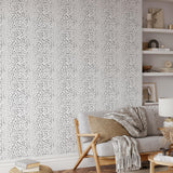 "Wall Blush's Charlie Black and White Wallpaper featured in a stylish living room setting."