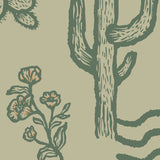 "Wall Blush’s Desert Dreamer (Green) Wallpaper showcasing cacti design in modern living room."