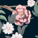 "Close-up of Wall Blush's Ophelia Wallpaper design with detailed floral pattern in a living space setting."

(Note: Since the image does not clearly show the type of room, I used a general term "living space." If the image were to include more context, a more specific room type could be used in the alt text.)