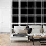Davenport Wallpaper by The Chelsea DeBoer Line in a stylish living room, chic plaid design focus.
