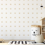 Dawn Wallpaper by Wall Blush SG02, sun-patterned design in a stylish children's room with toys.
