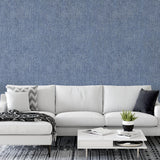Levi Wallpaper by Wall Blush SG02 in a stylish living room, highlighting the textured blue wall design.
