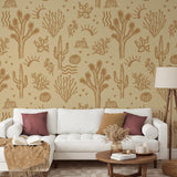"Wall Blush's Desert Dreamer (Orange) Wallpaper in a cozy living room with a white sofa and chic decor."