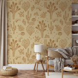 "Wall Blush's Desert Dreamer (Orange) Wallpaper featured in a cozy living room setting, emphasizing the bold pattern."