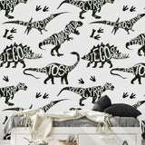 Dino Rush Wallpaper by Wall Blush in a stylish kids' bedroom, with dinosaur patterns as the focal point.
