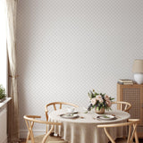 "Dining room with Wall Blush brand Doodle Dot Wallpaper as the feature wall accentuating modern home decor."