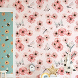 Wall Blush's Dragonlily (Blush) Wallpaper in a stylish children's room, featuring floral and insect patterns.
