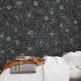 Alt text: Elegant bedroom featuring The Dutchess (Black) Wallpaper from The Ania Zwara Line, with a focus on the floral pattern.
