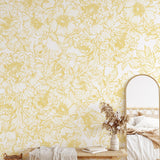 The Dutchess (Mustard) Wallpaper by The Ania Zwara Line in a modern bedroom setting, with a focus on the floral design.
