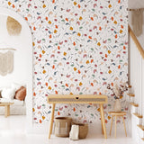 "Dream On Wallpaper by Wall Blush in a cozy living room interior with focus on floral wall design."