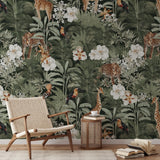 "Tanzania (Green) Wallpaper by Wall Blush in a modern living room, featuring vibrant jungle and wildlife design."