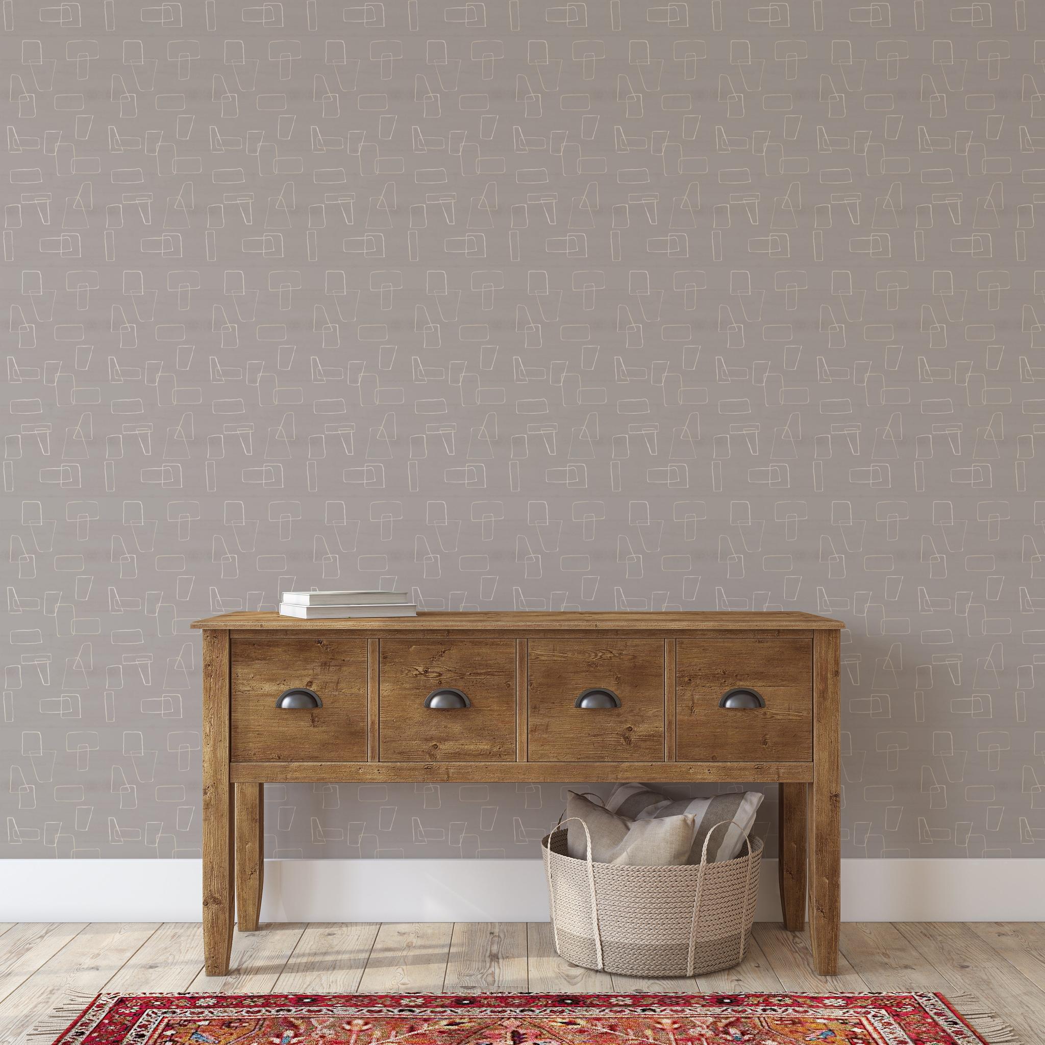"Wall Blush's Greyson Wallpaper featured in a stylish living room setting, with a focus on the elegant wall design."