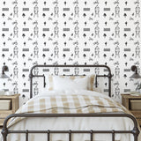 G-Town Vibes Wallpaper from The Minty Line enhancing a cozy bedroom, highlighting the unique design focus.
