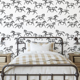 Spirit Wallpaper by Wall Blush SG02 featuring equestrian pattern in a cozy bedroom focus on wall decor
