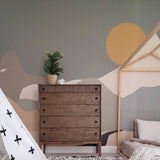 Alt text: Journey Wallpaper by Wall Blush showcased in a stylish children's room, with modern furnishings and playful decor.

