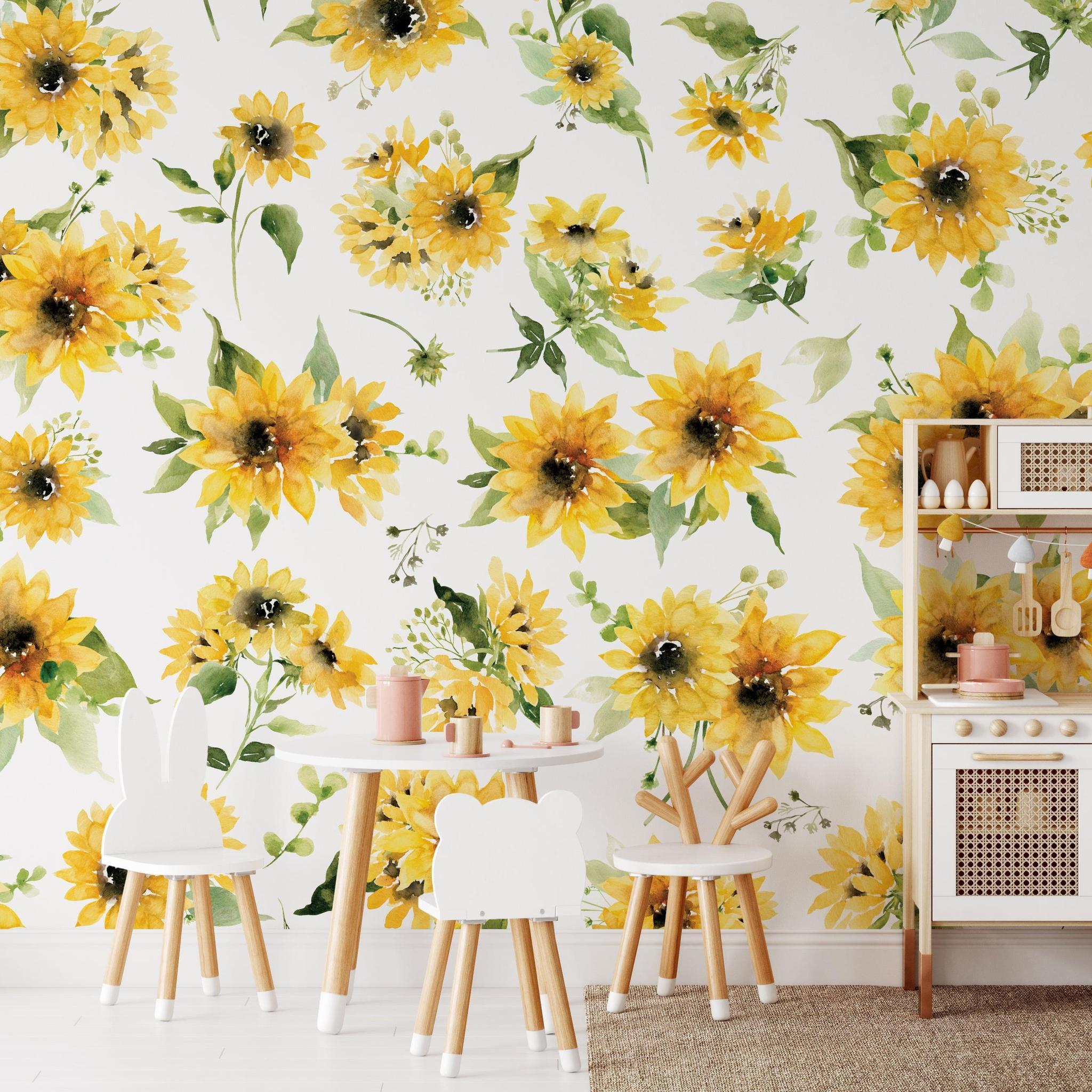 Juniper Wallpaper by The Chelsea DeBoer Line in a bright kids' playroom, showcasing vibrant floral patterns.
