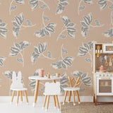Leah Wallpaper by Wall Blush in a stylish children's room, showcasing elegant leaf patterns.
