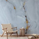 "Elegant Lux Wallpaper by Wall Blush in a modern living room, showcasing accent chair and stylish decor."
