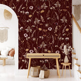 "Dahlia (Maroon) Wallpaper by Wall Blush accenting stylish living room with natural decor and furniture."