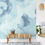 "Wall Blush's BIG MOOD (Blue) Wallpaper featuring in modern living room with stylish decor accents."