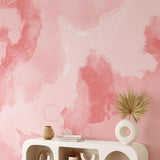 The MB Line's BIG MOOD (Pink) Wallpaper featured in a stylish, modern living room setting with decorative shelving.
