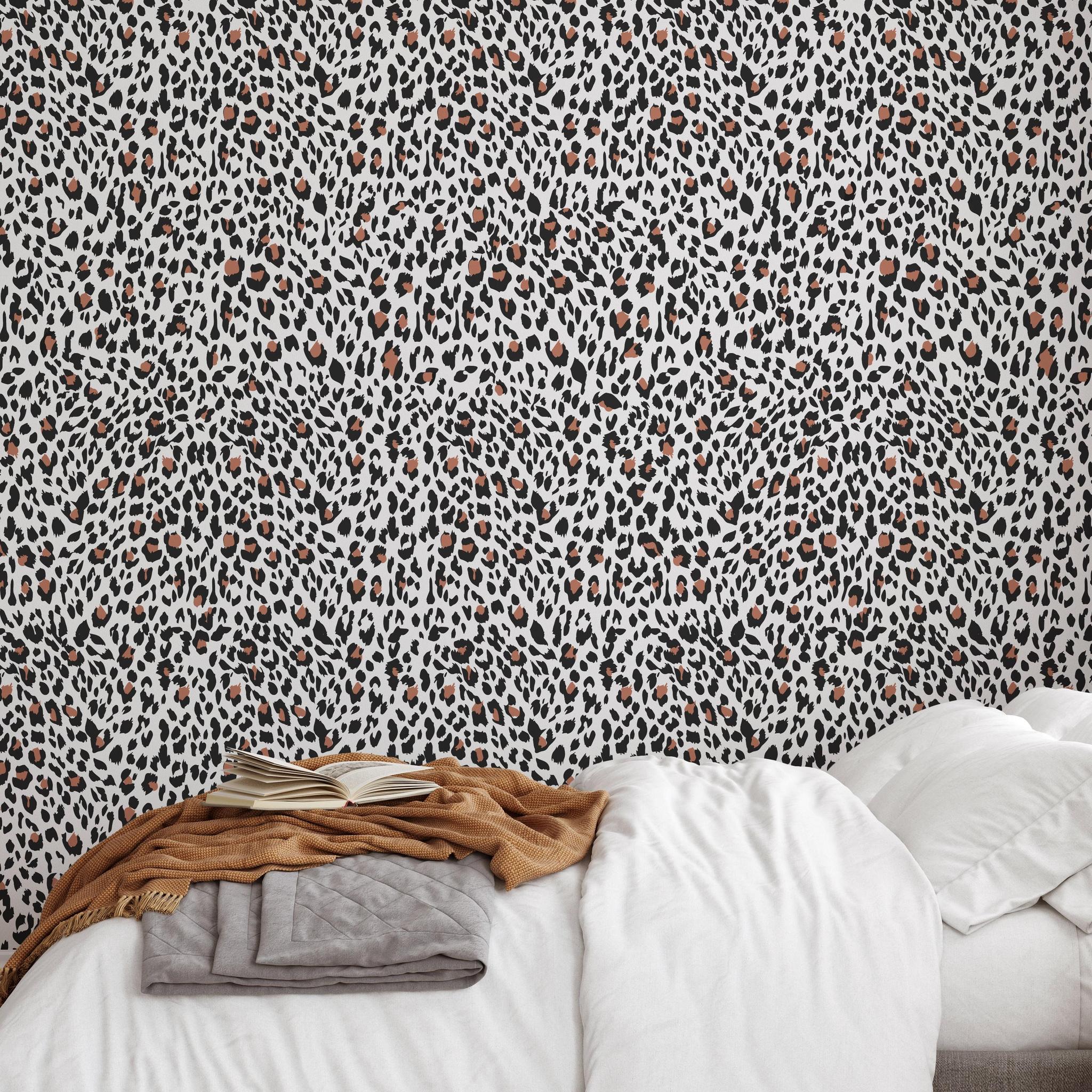 Nala Wallpaper by The Chelsea DeBoer Line featured in a stylish, cozy bedroom setting, highlighting the unique pattern.
