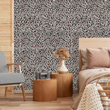 Nala Wallpaper from The Chelsea DeBoer Line featured in a cozy modern bedroom, highlighting the bold pattern as the main focus.

