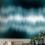 Stylish Wall Blush Oceanside Wallpaper in a modern living room setting, emphasizing the wall's texture and color gradient.
