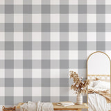 Wall Blush Oswald - Buffalo Check Wallpaper in a modern bedroom, focus on stylish grey and white pattern.
