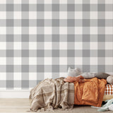 Wall Blush's Oswald - Buffalo Check Wallpaper in a stylish kids' bedroom, showcasing the modern pattern and cozy decor.
