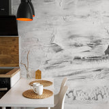 Modern kitchen featuring The A&S Line's Paint It Black Wallpaper, artistic monochrome focus.
