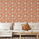 Peachy Perfect Wallpaper by The Minty Line featured in modern living room decor, highlighting the wall's design and texture.
