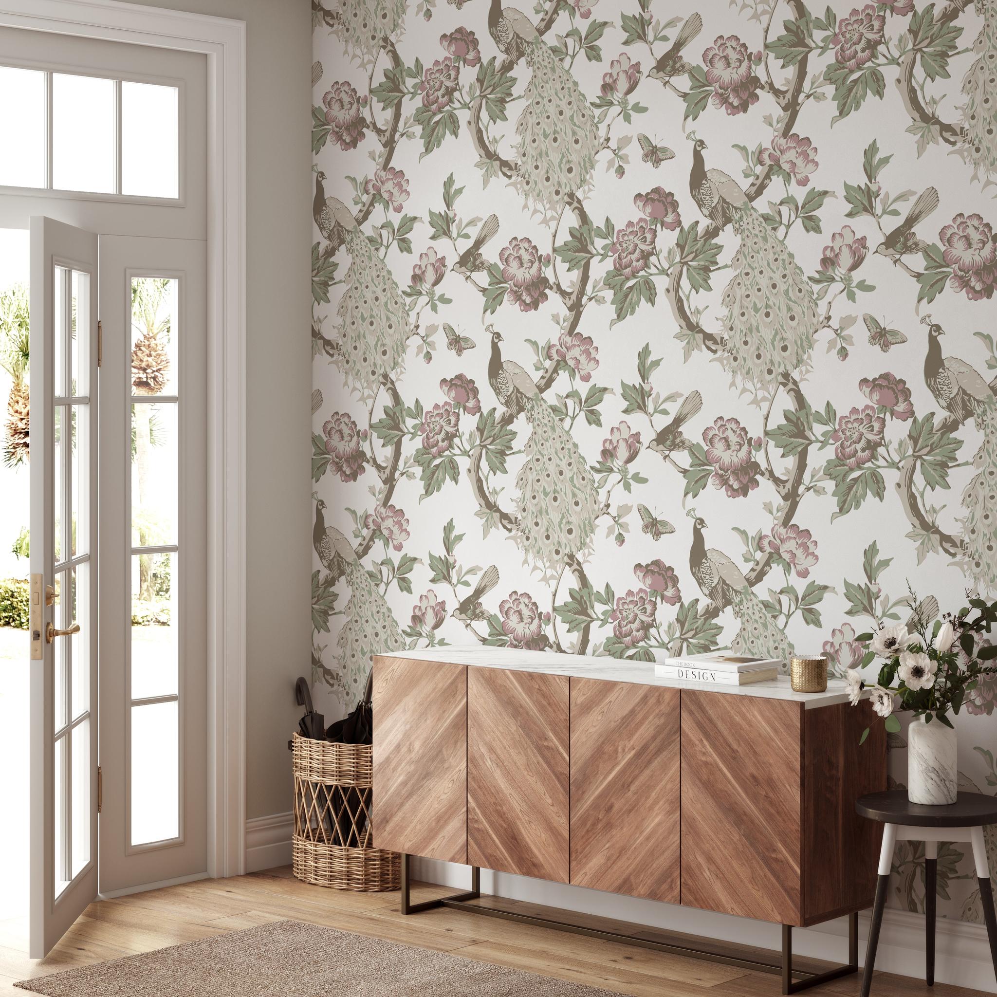 "Elegant Wall Blush Hera (Pink) Wallpaper in a modern living room, showcasing stylish bird and floral design."