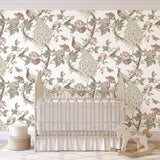 Hera (Pink) Wallpaper by Wall Blush SG02 enhancing a nursery room, focusing on elegant floral design.
