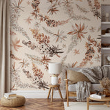 "Piper’s Meadow Wallpaper by Wall Blush in a cozy living room, with floral patterns enhancing the wall space."
