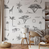 Wall Blush's Pride Lands Wallpaper in a cozy living room, highlighting safari-themed decor.