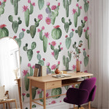 "Wall Blush's Prickly Princess Wallpaper in a stylish home office with a focus on the vibrant cactus pattern."