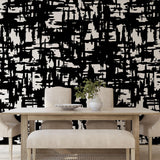 Dining room featuring Mirage Wallpaper by The Stefanie Bloom Line, abstract black and white design focal point.

