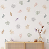 Sally Wallpaper by Wall Blush SG02 in a modern living room, showcasing elegant botanical prints.
